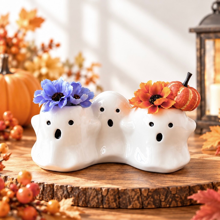 大人かわいいハロウィン「3匹のおばけ」ポットアレンジ｜コスモスとかぼちゃ｜秋のインテリア 3匹のおばけさんが仲良く並んだ、
大人かわいいハロウィンのポットアレンジです。????????????

左のおばけさんには紫色のコスモス、
右のおばけさんには鮮やかなオレンジのコスモスと小さなかぼち koharubiyori